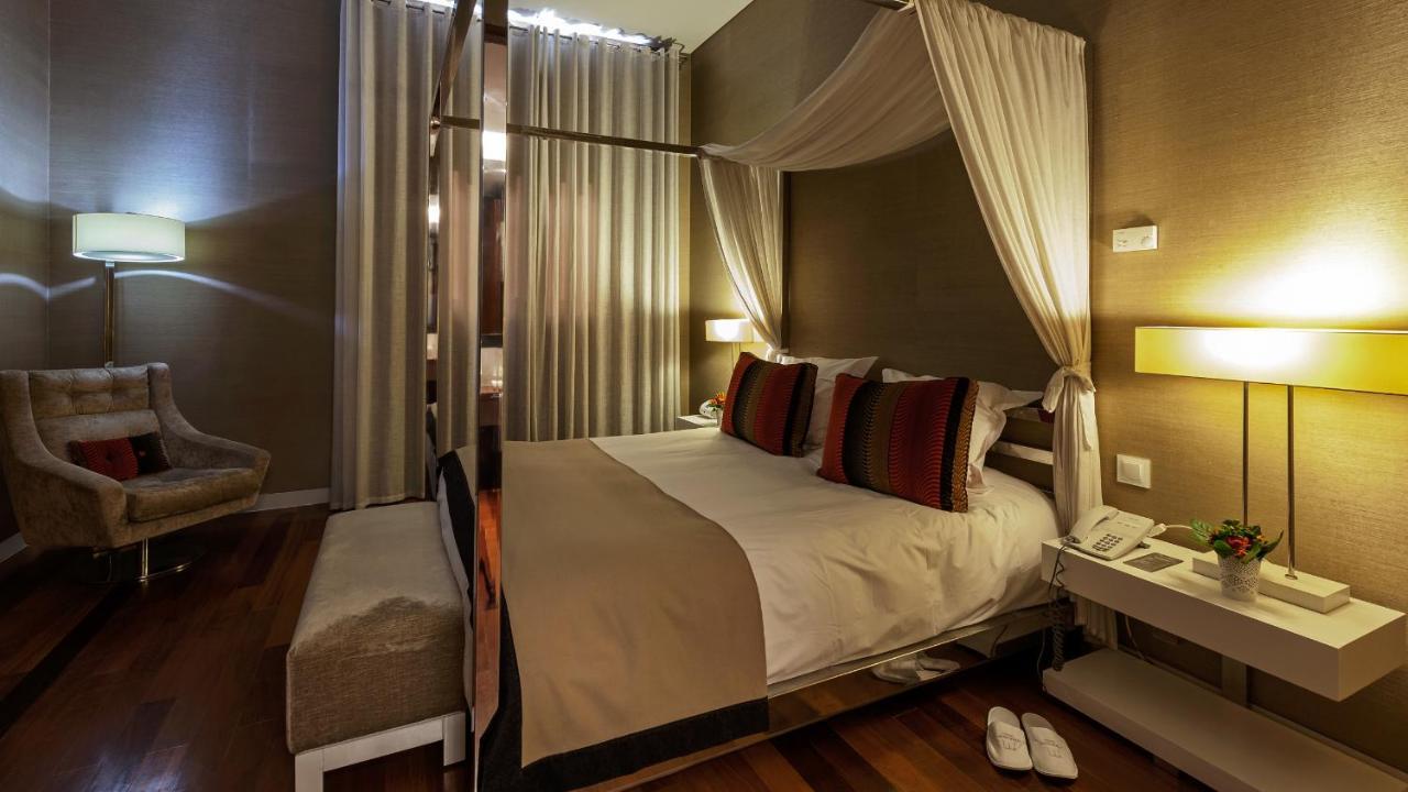 Hotel M'Ar De Ar Aqueduto Évora Exteriér fotografie A bedroom at the hotel