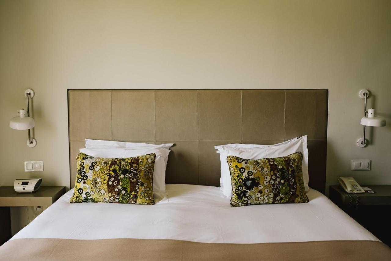 Hotel M'Ar De Ar Aqueduto Évora Exteriér fotografie A bed with a headboard
